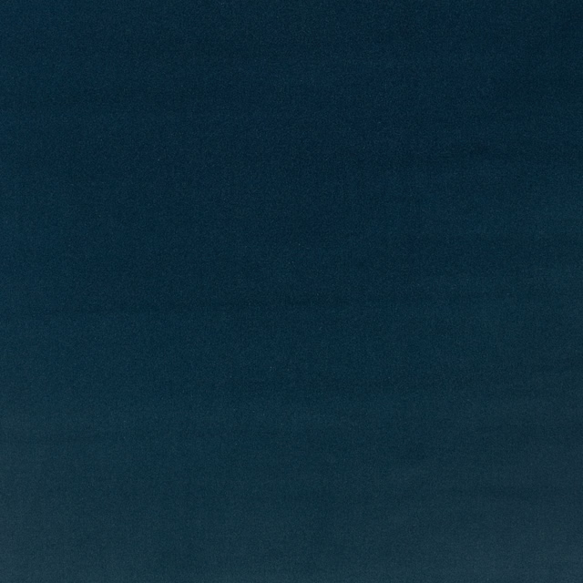 Deep blue-teal plain velvet showing softly shifting pile and subtle horizontal tonal bands