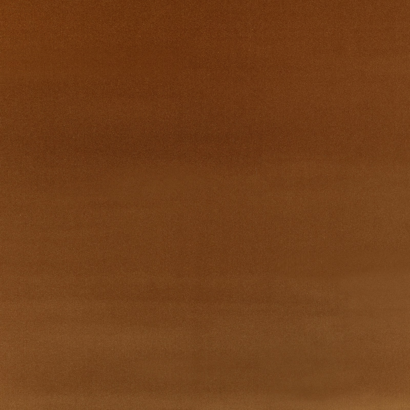 Warm umber-brown velvet showing a smooth nap with subtle directional tonal shading