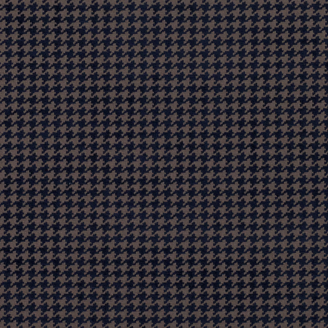 Close-up of deep navy and taupe woven houndstooth fabric with a tight repeat