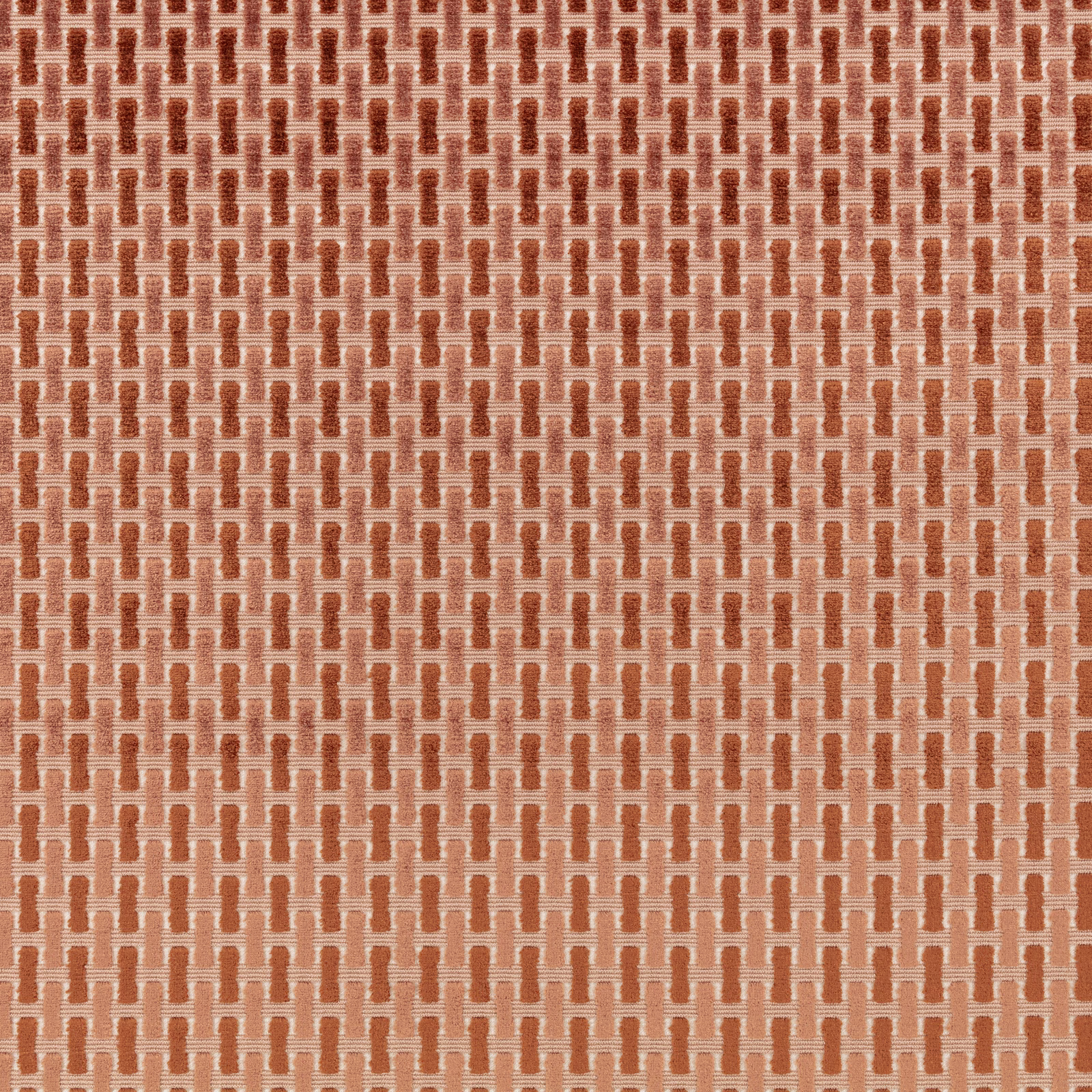Rust terracotta and peach woven fabric with a small ladder-grid motif