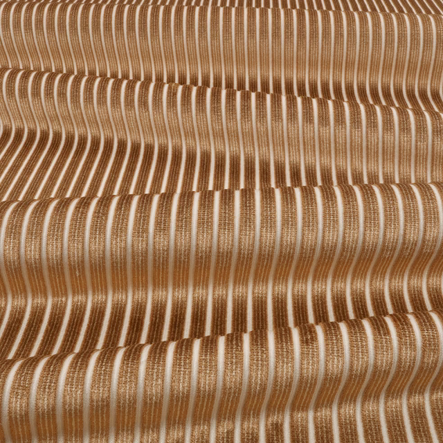 Warm copper and ivory undulating vertical stripes in a tactile textured weave