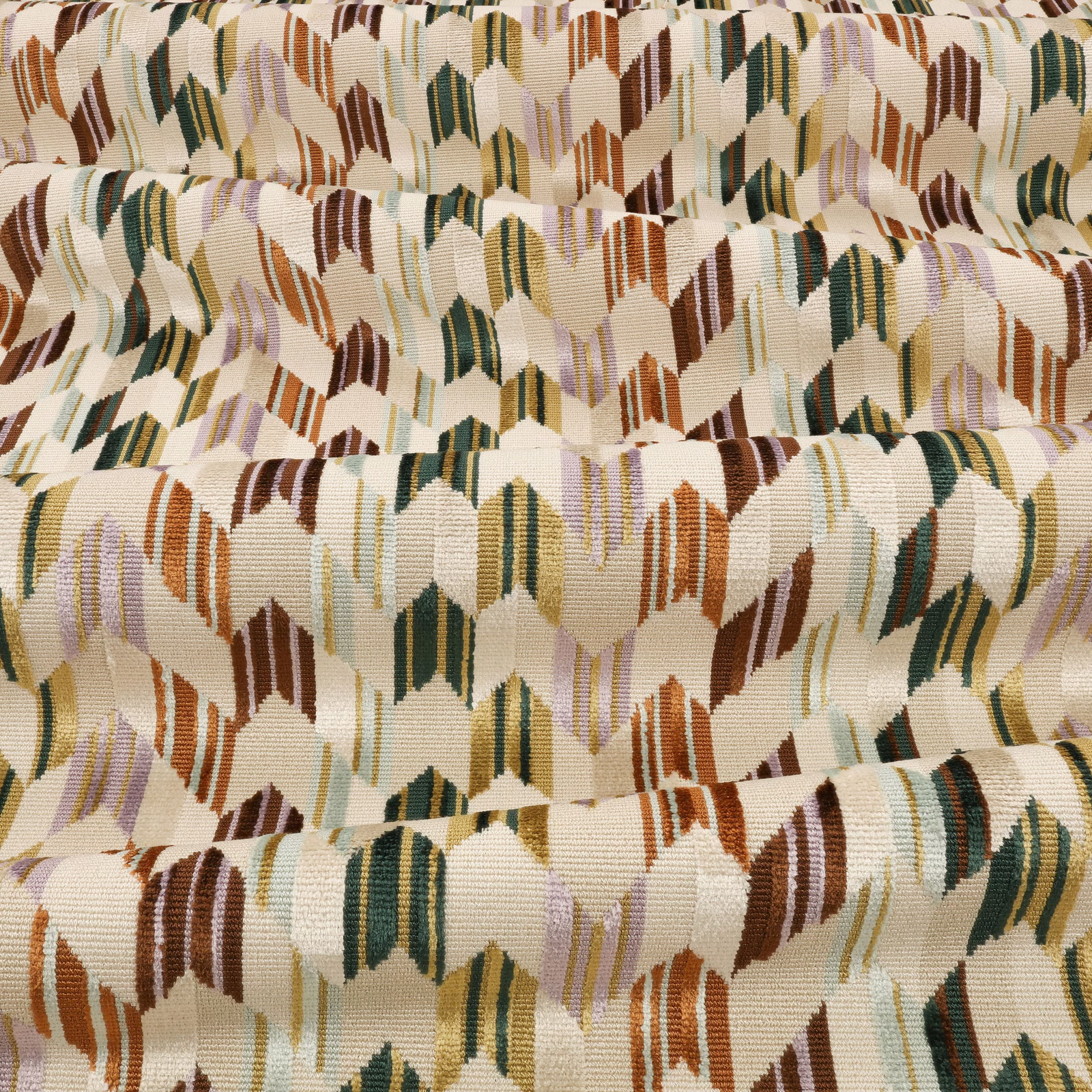 Cream woven swatch with rust, olive, brown and lilac geometric brushstroke motifs