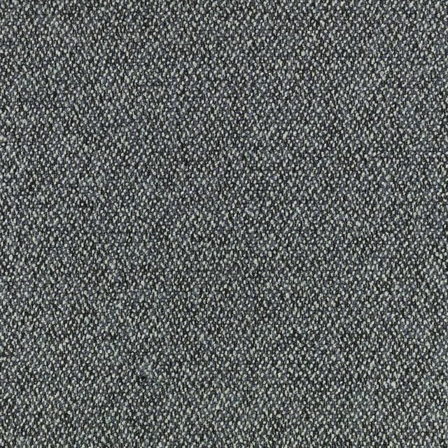 Close-up of charcoal grey woven fabric with fine pale flecks and nubby texture