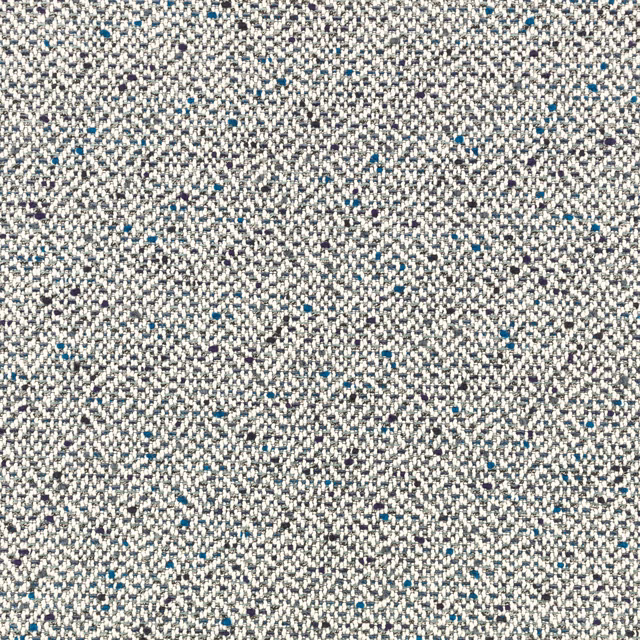 Close-up of grey and cream woven fabric with scattered teal-blue flecks