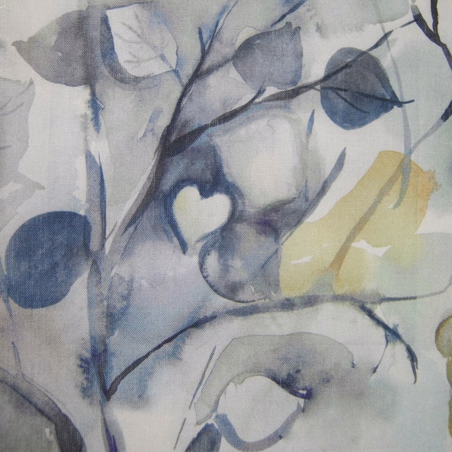 Abstract blue-grey and pale yellow painterly fabric swatch with leaf-like forms