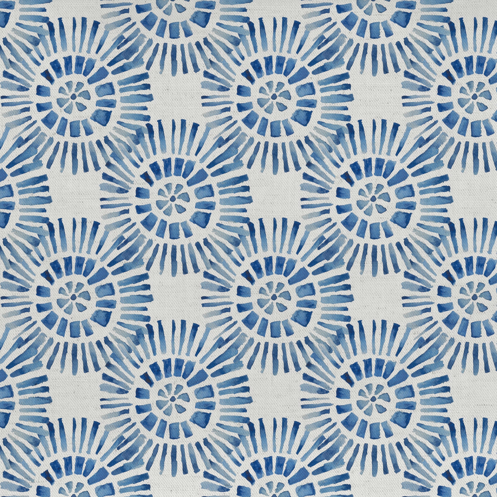 Blue circular sunburst print on an off-white cotton-linen fabric swatch