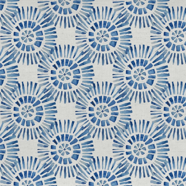 Blue circular sunburst print on an off-white cotton-linen fabric swatch