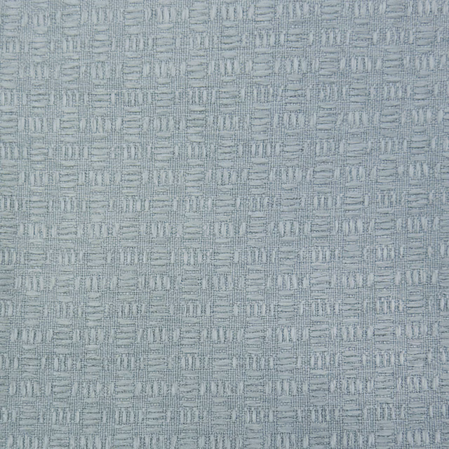 Pale grey woven geometric fabric swatch with subtle textured repeat