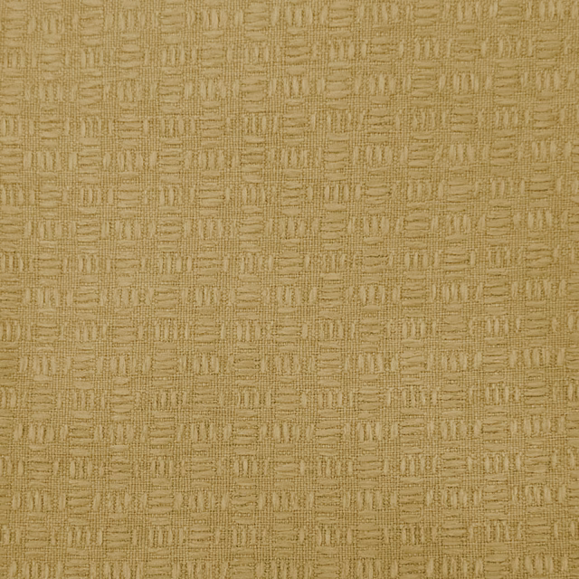 Textured muted mustard yellow woven fabric with small geometric repeat