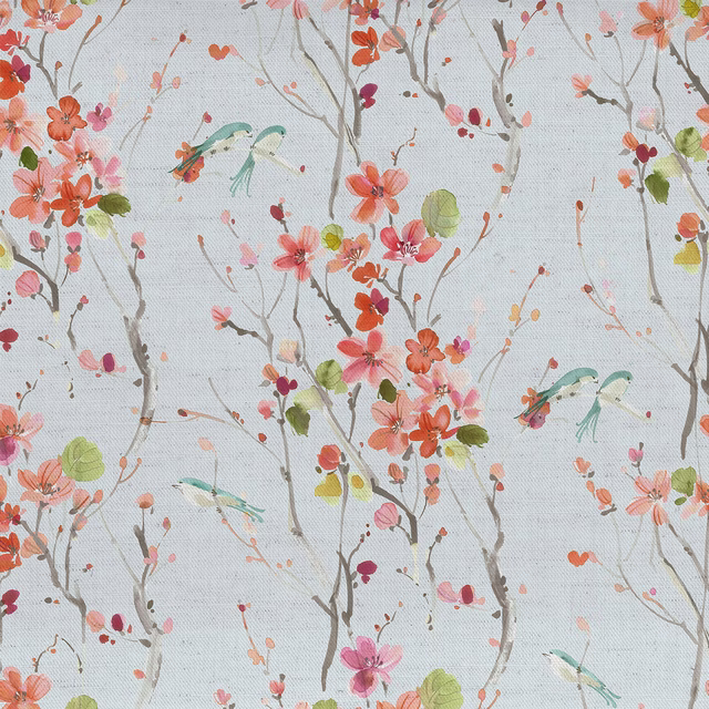 Pale floral fabric with coral blossoms, green leaves and fine grey branches