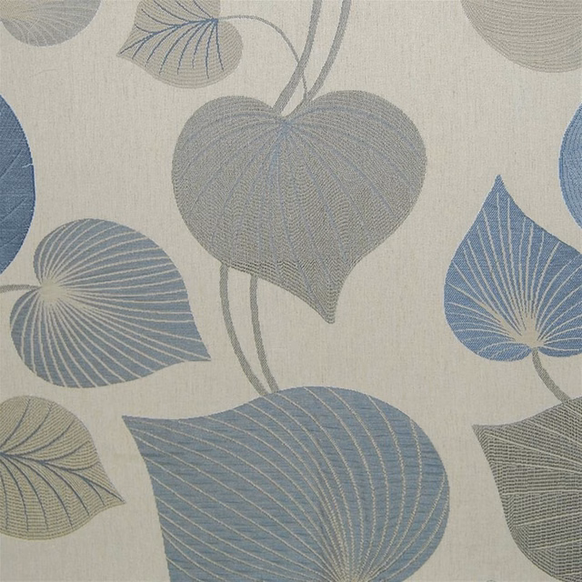 Misty blue and grey oversized leaf motif on an ivory woven fabric swatch