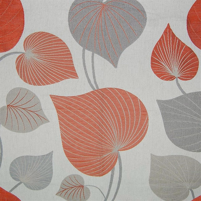 Coral orange and soft grey leaf motif on a pale linen-look fabric