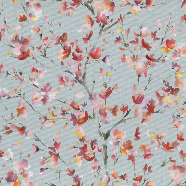 Painterly blossom branch fabric on a pale powder-blue ground with pink, coral and lilac flowers