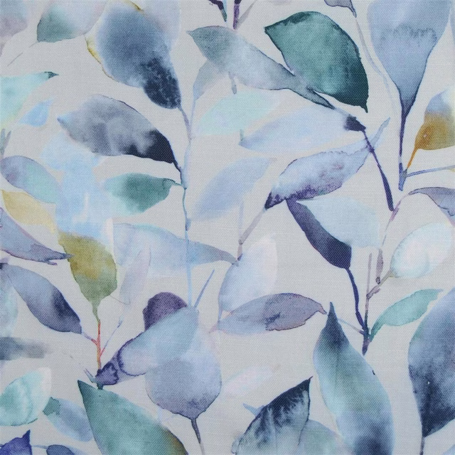 Painterly leaf-print fabric in pale blue, teal and navy on a light ground