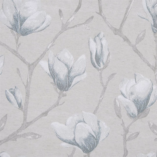 Soft silver-grey botanical fabric with pale floral blooms and slender stems
