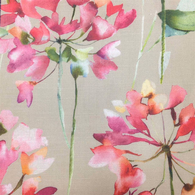 Pale ground floral fabric with large pink and coral watercolour blooms and green stems