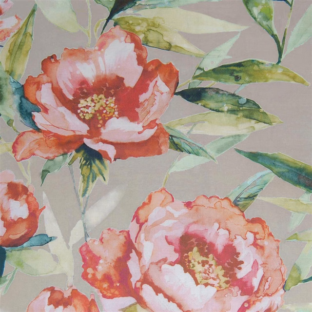 Painterly large-scale floral fabric with pink blooms and green leaves on soft grey ground