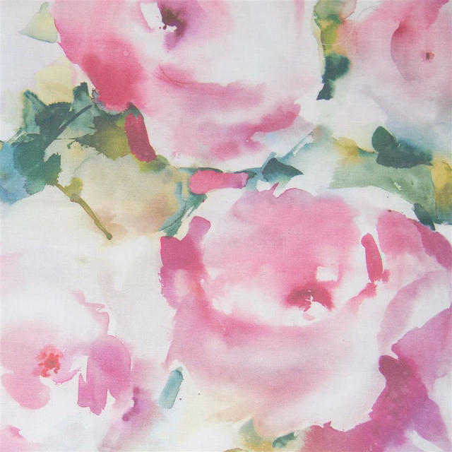 Large painterly pink and green floral fabric on a pale ground