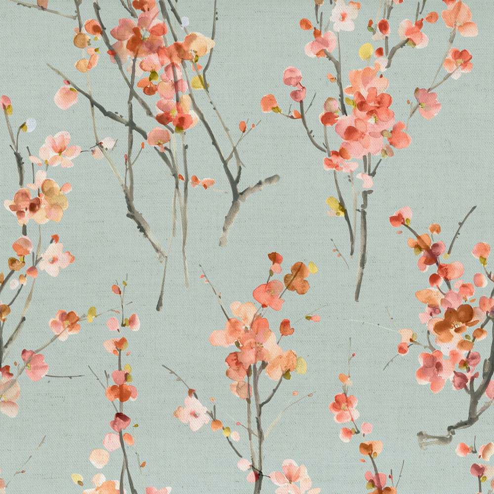Pale blue fabric with scattered coral pink blossom branches and grey stems
