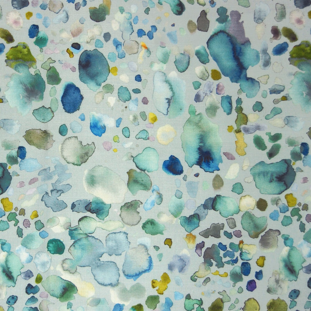 Watercolour scatter print in mint, teal and blue-green on a pale ground