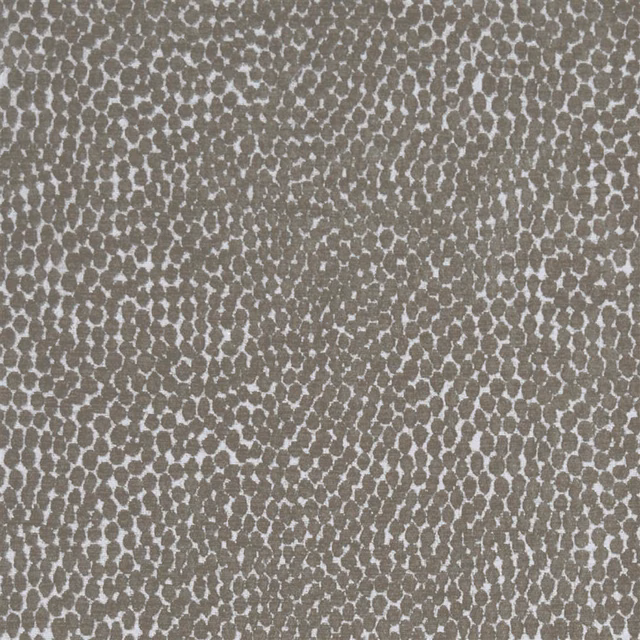 Close-up of pebble brown patterned fabric with pale speckled spots