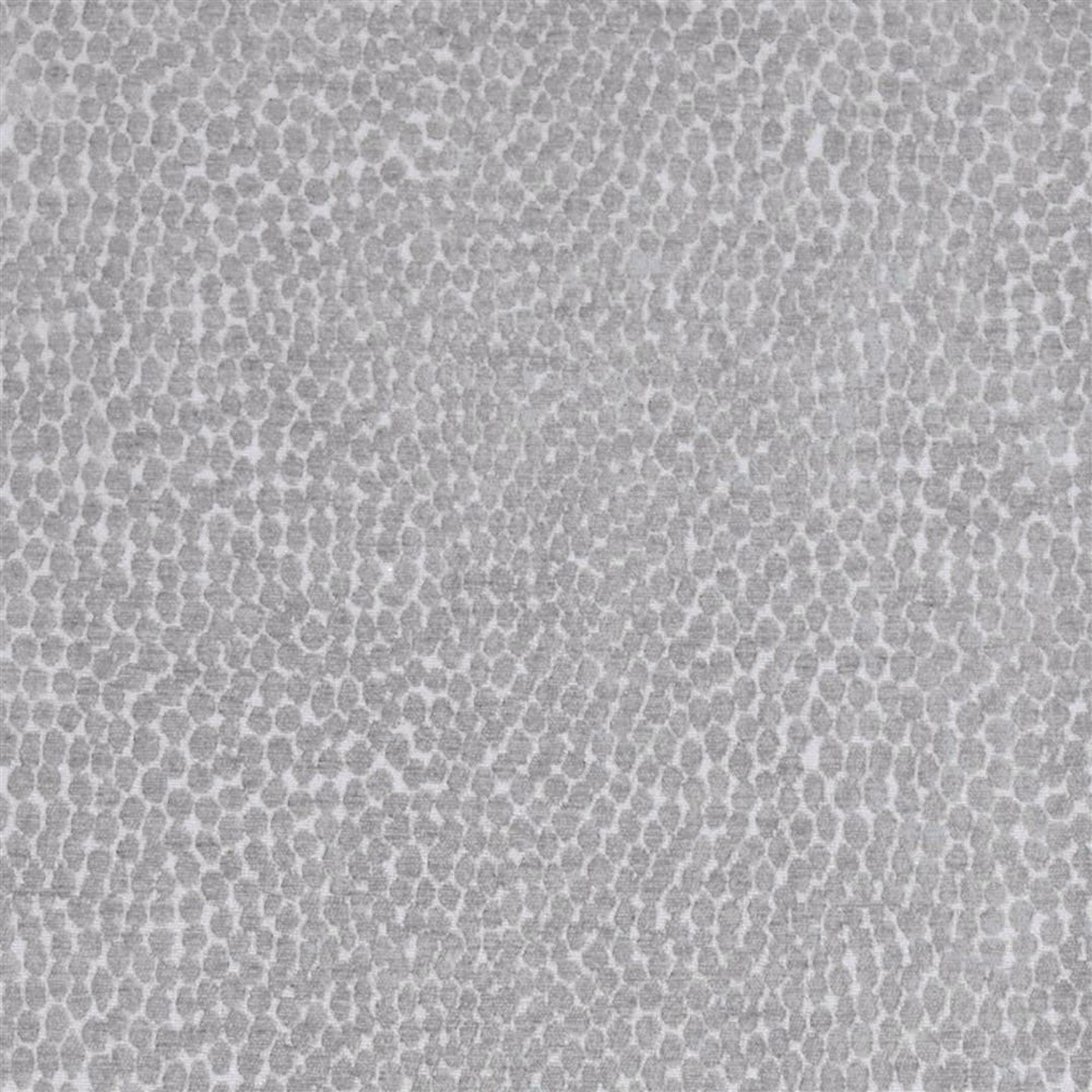 Close-up of soft pebble grey woven fabric with small mottled abstract pattern