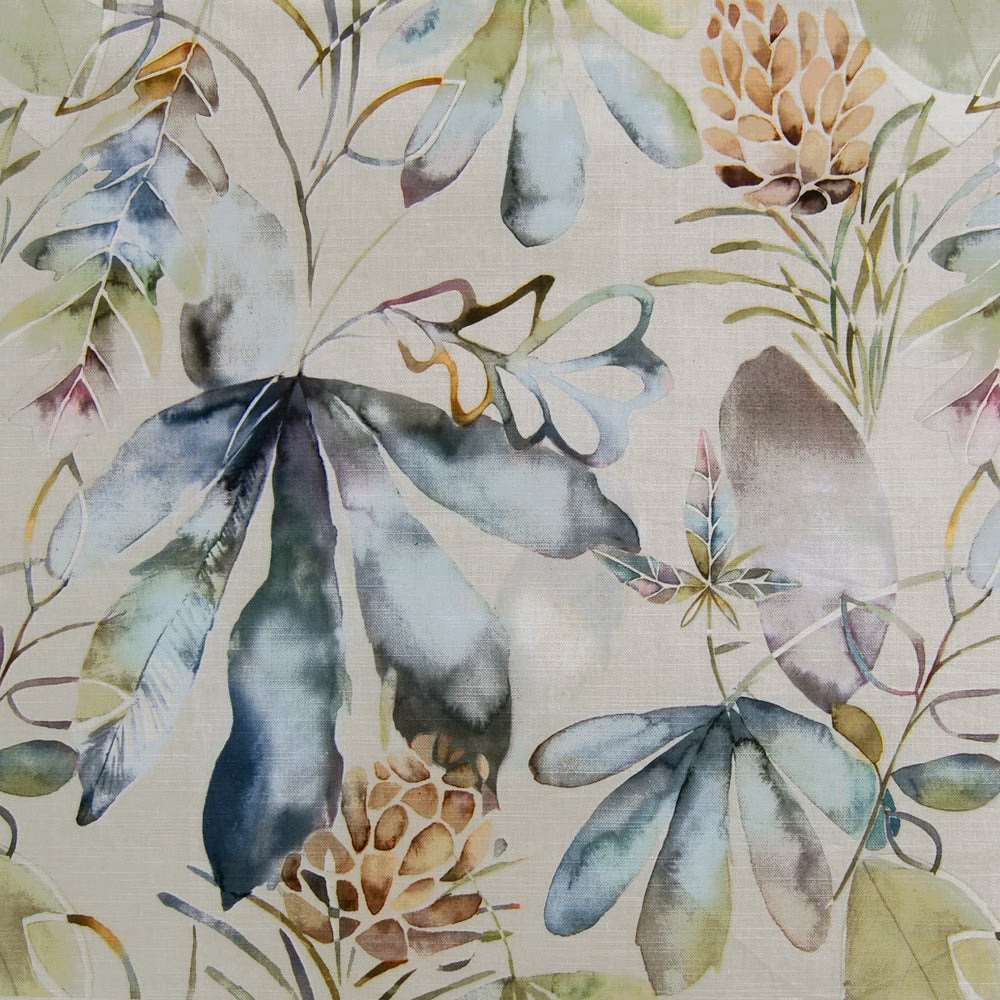 Painterly botanical fabric on a pale grey ground with blue-green leaves and muted florals