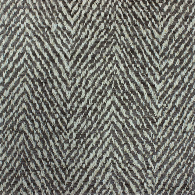 Close-up of grey herringbone woven fabric with pale marl highlights