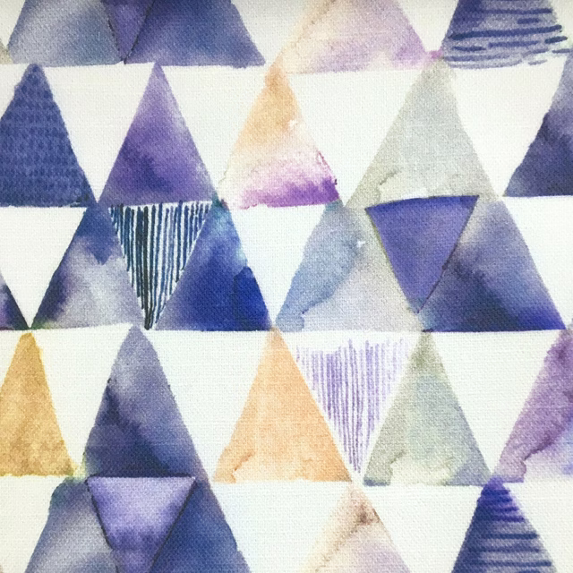 Triangle geometric fabric swatch in indigo, blue, lilac and cream