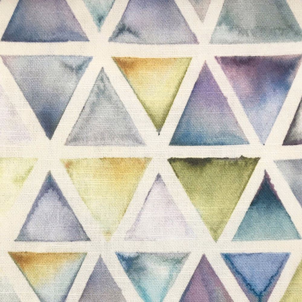 Pastel triangle geometric fabric with white lattice and soft woven texture