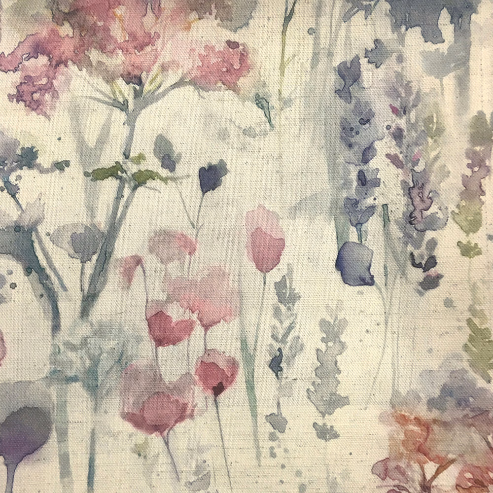 Watercolour floral fabric with blush pink blooms and soft green stems on a pale ground