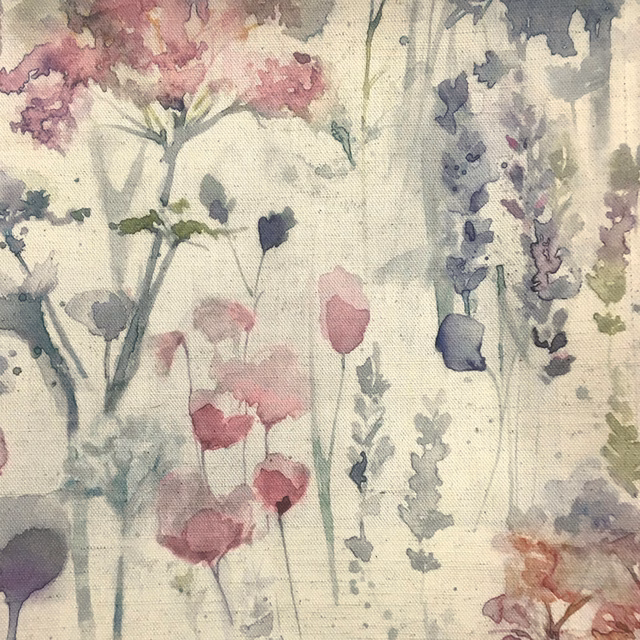 Watercolour floral fabric with blush pink blooms and soft green stems on a pale ground