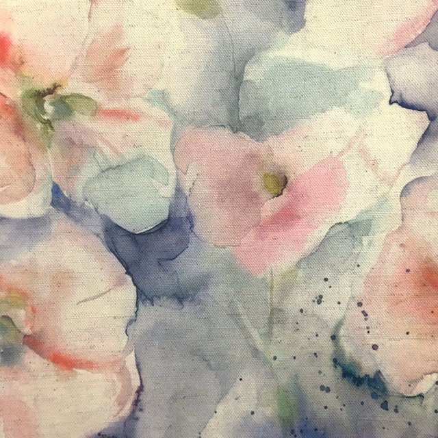 Painterly blush pink floral fabric with soft blue and cream watercolour blooms