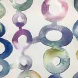 Painterly ring motif fabric in lilac, teal, blue and green on a white ground