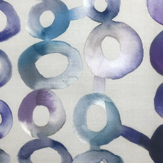 Abstract painterly ring pattern in cool purple, lilac and blue on pale ground