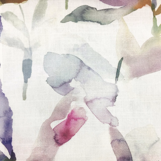 Painterly lilac and plum abstract fabric on an off-white woven ground