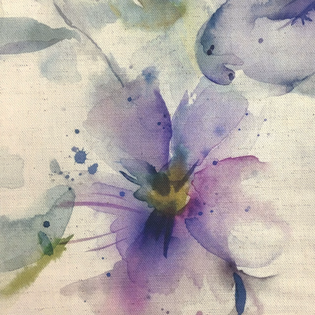 Painterly lilac-purple floral swatch with soft blue-green accents on a pale ground