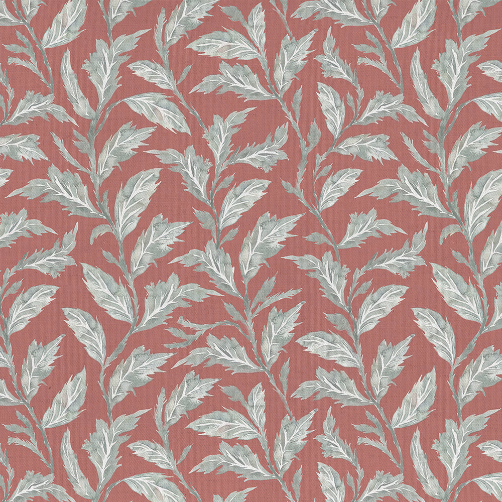 Terracotta orange botanical fabric with pale leaf motif and woven texture