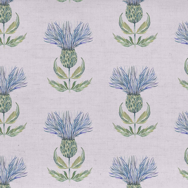 Pale linen-look fabric with blue thistle motifs and green leaves