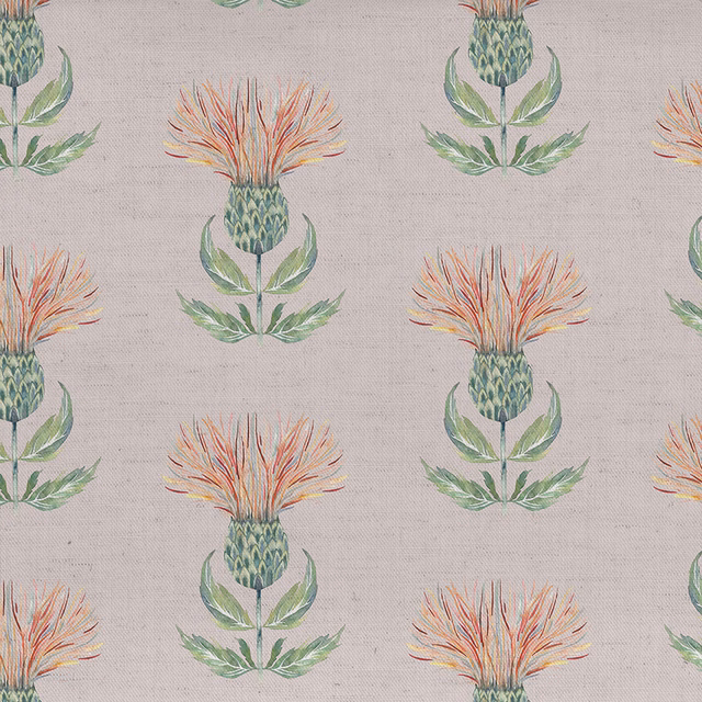 Repeat floral fabric with coral orange blooms and sage green leaves on a pale linen ground
