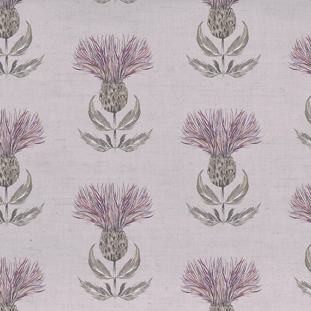 Pale blush fabric with repeated thistle motif in pink, sage and grey