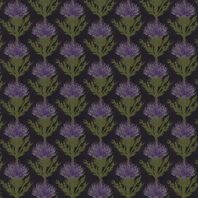 Close-up of a thistle pattern in purple and olive on a dark woven ground