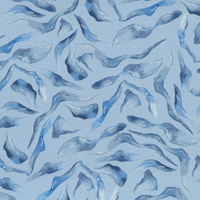 Pale blue cotton fabric with painterly abstract blue swirls and watery texture