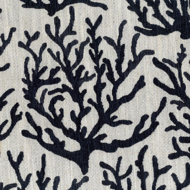 Close-up of lagoon blue coral motif on a pale textured woven fabric