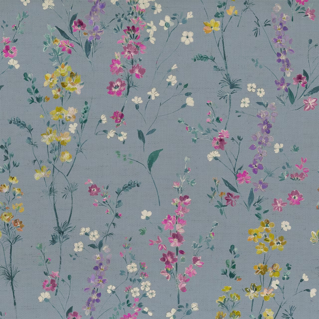 Blue floral fabric swatch with scattered pink, lilac, yellow and cream meadow flowers