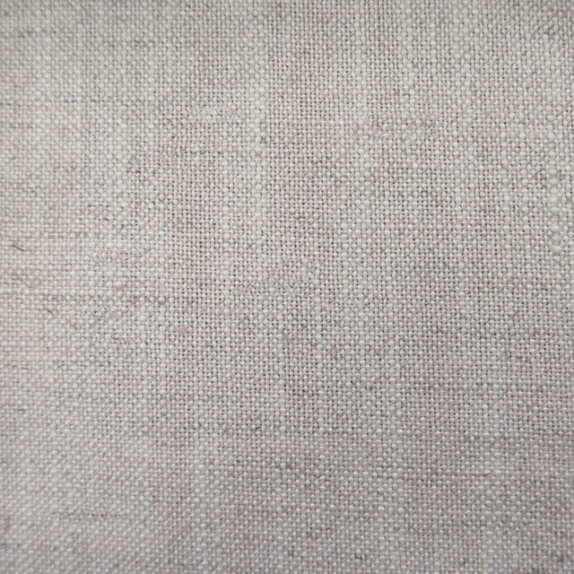 Close-up of Hawley Grey plain woven fabric in soft stone grey