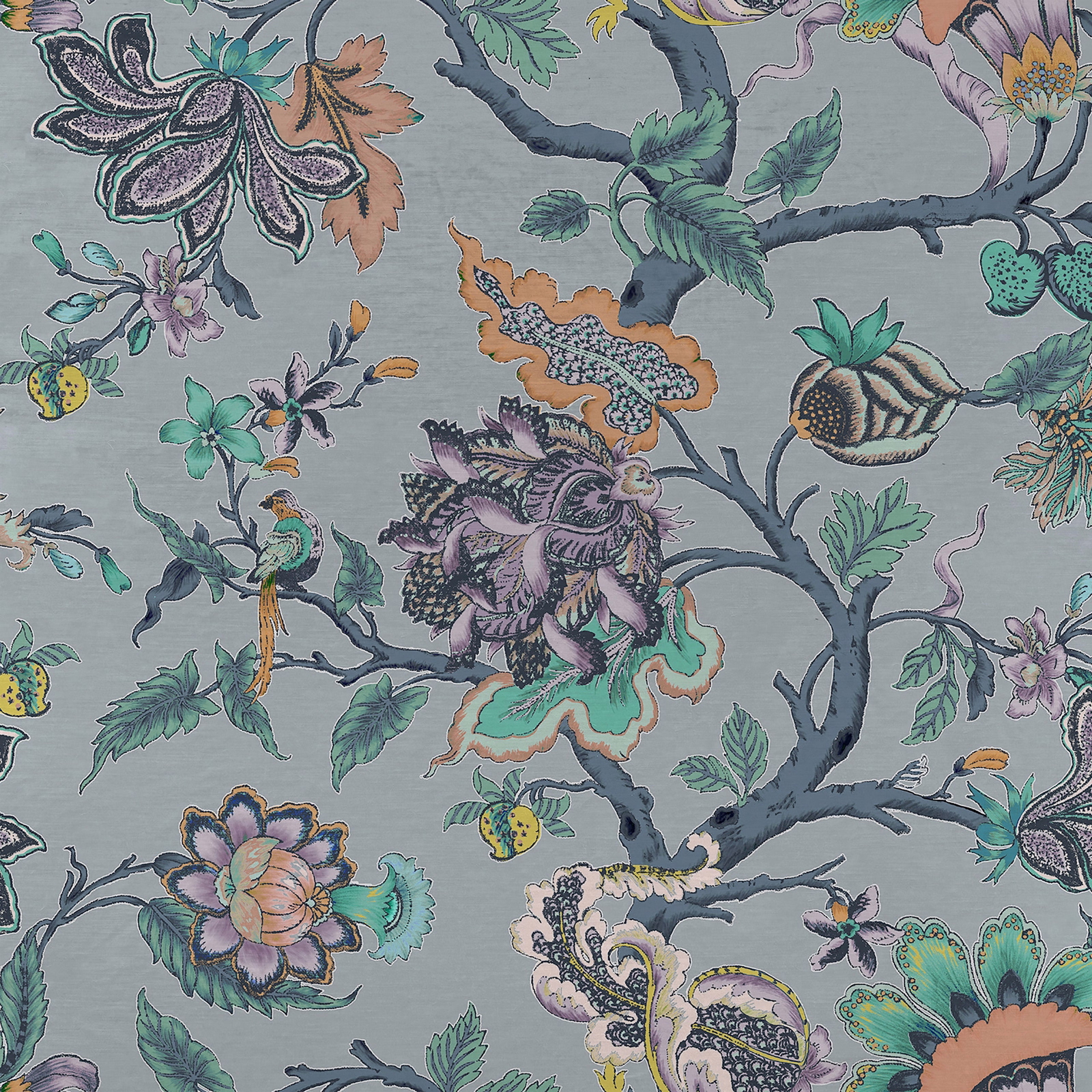 Close-up of multicolour botanical fabric on a pale grey ground with dark branches and flowers
