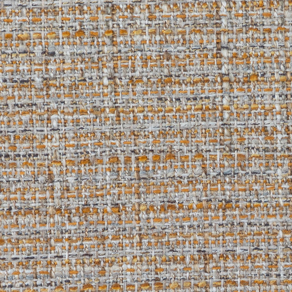 Close-up of textured woven fabric in muted yellow, grey and ochre slubs