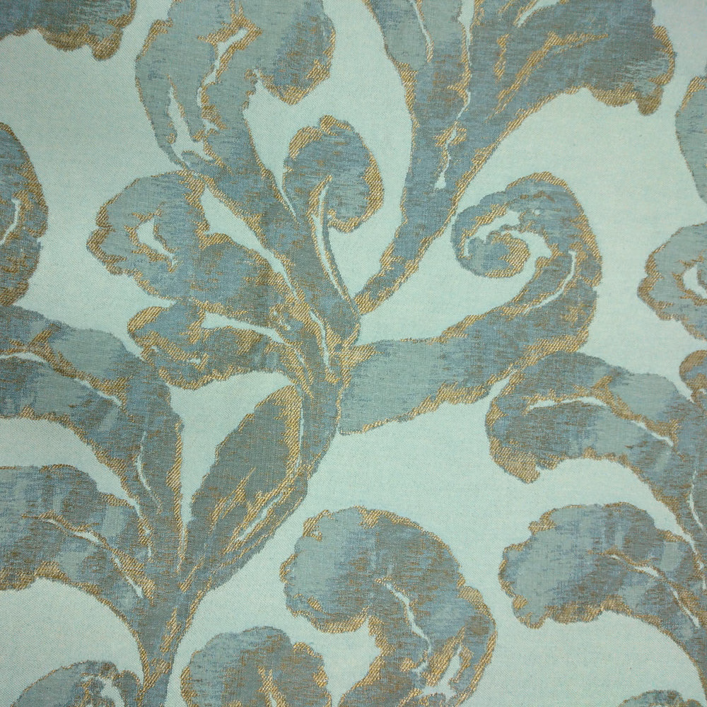 Large aqua-blue damask scrolls with gold edging on a pale mint ground