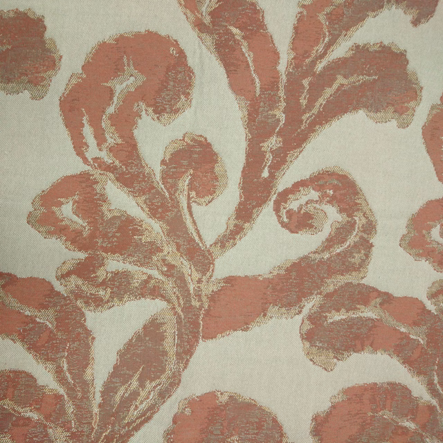 Large scrolling damask motif in muted terracotta orange on a pale woven ground